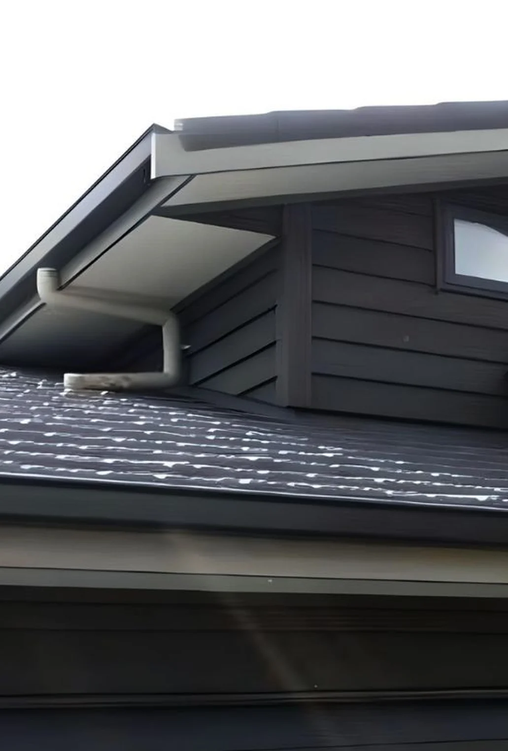 Completed roof painting on an Auckland home
